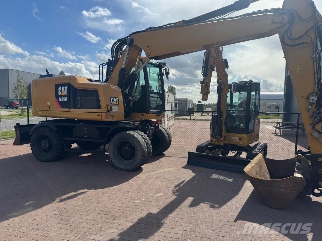 CAT 318 Lastik tekerli ekskavatörler