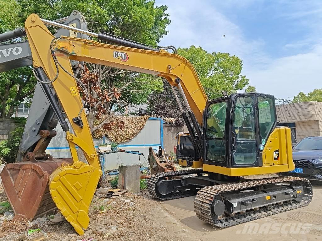 CAT 310 Paletli ekskavatörler
