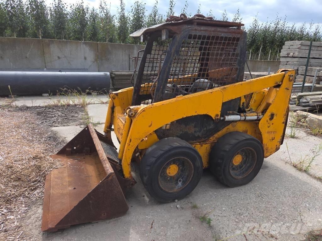 Komatsu SK 714 Skid steer loderler