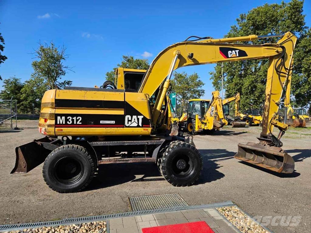 CAT M 312 Lastik tekerli ekskavatörler