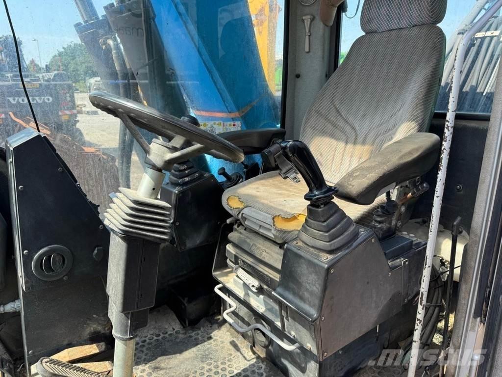 Fuchs MHL 320 Atık taşıma araçları