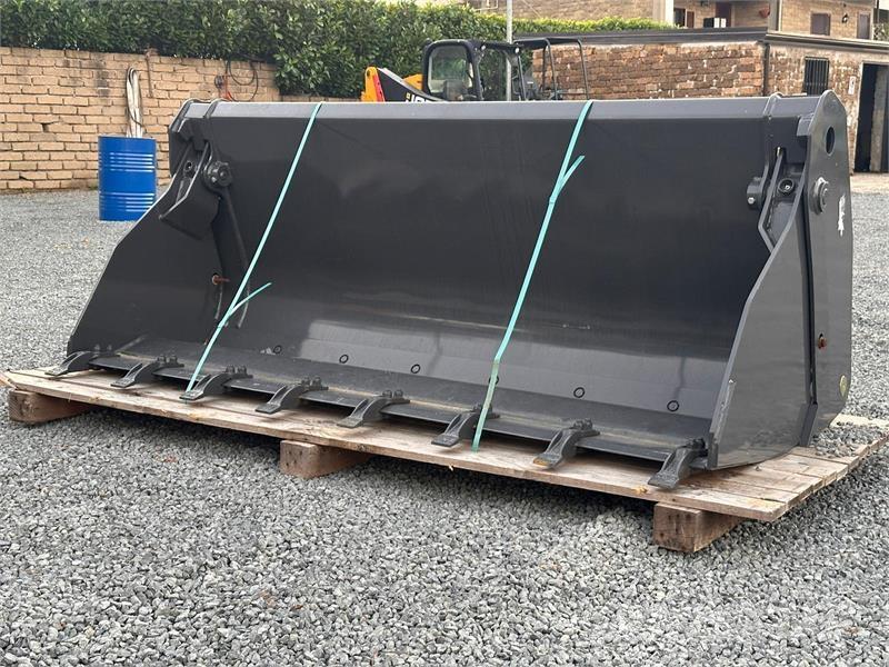 New Holland 220 Kovalar