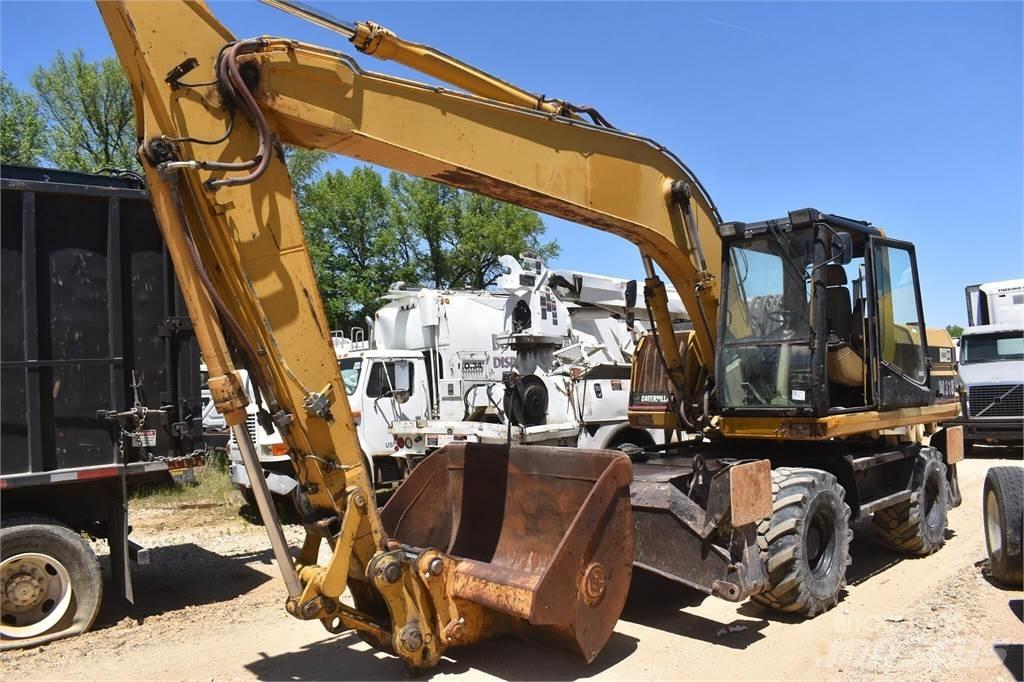 CAT M318 Lastik tekerli ekskavatörler