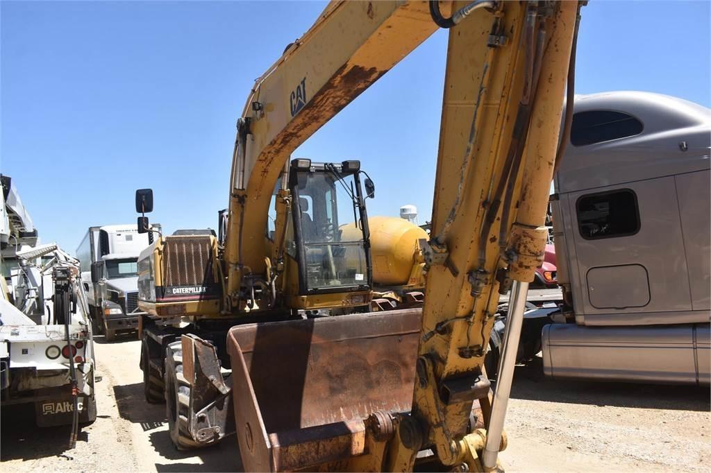 CAT M318 Lastik tekerli ekskavatörler