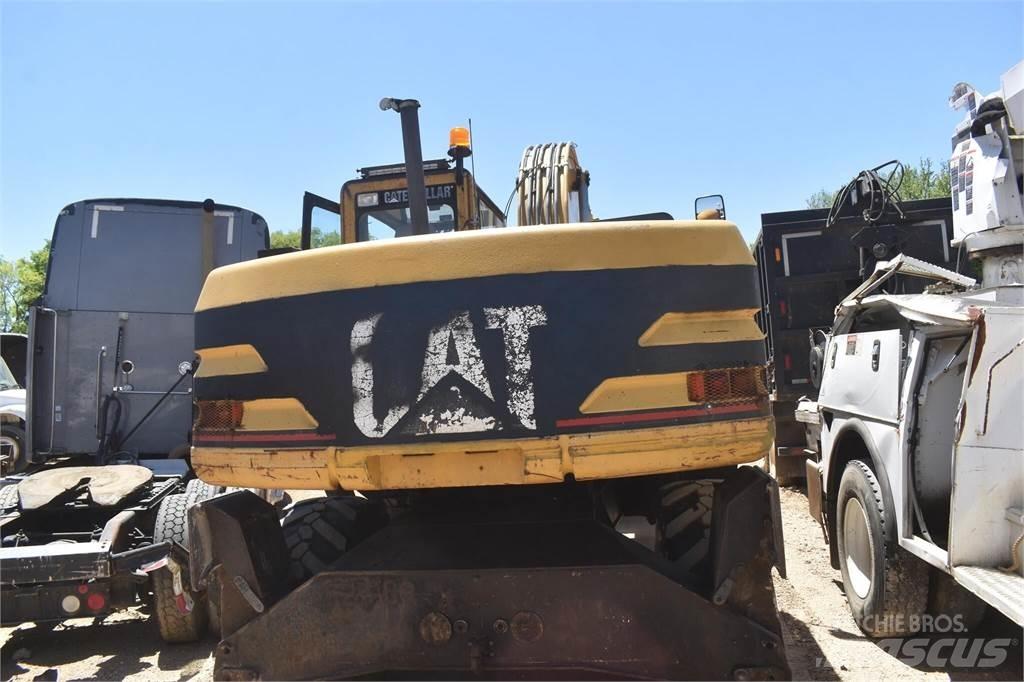 CAT M318 Lastik tekerli ekskavatörler