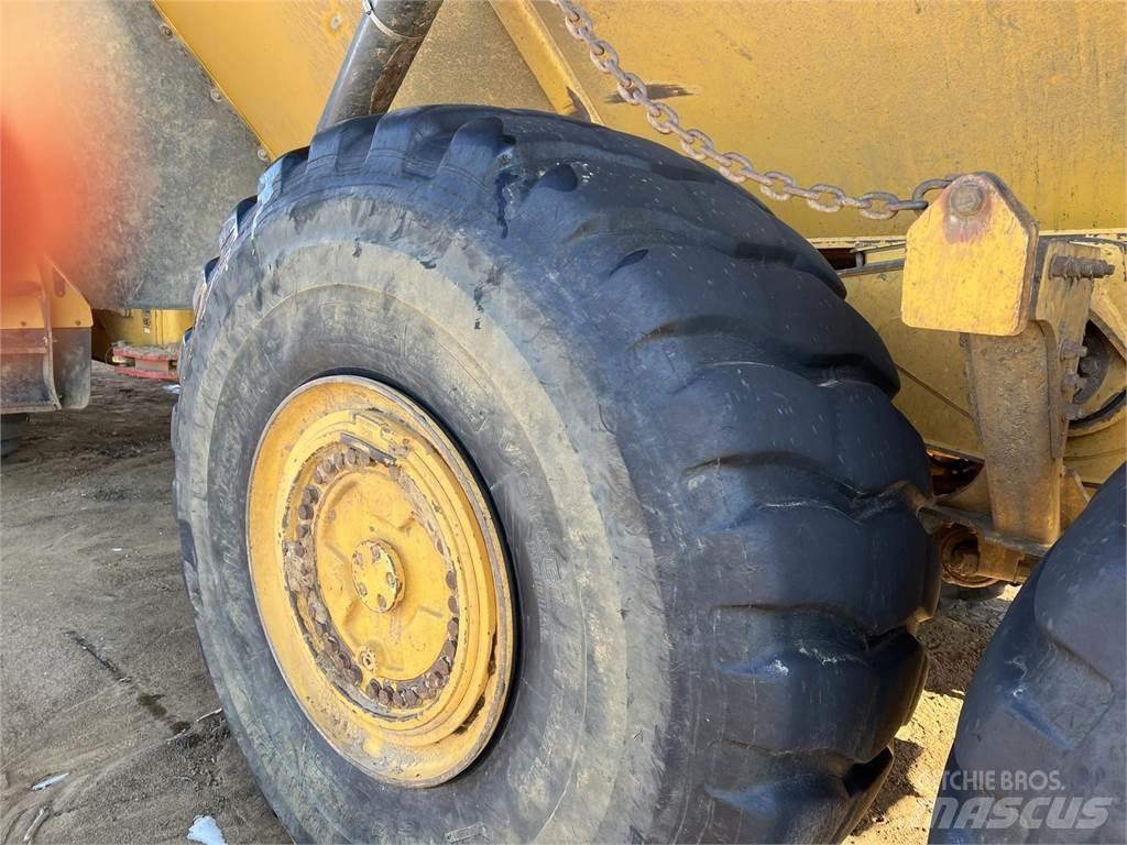 John Deere 460E Belden kirma kaya kamyonu