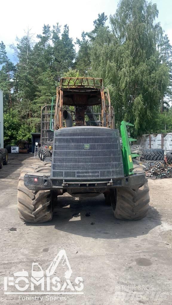 John Deere 1110 E Sanzuman