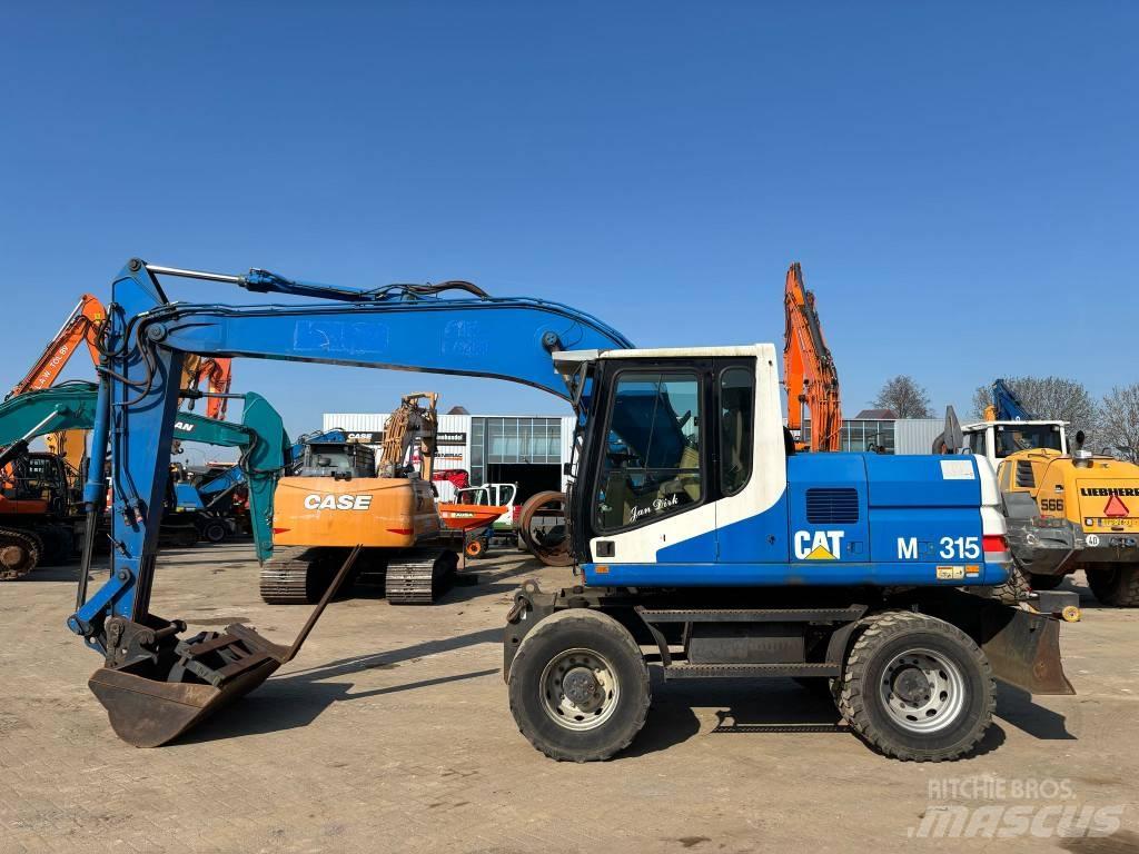CAT M 315 Lastik tekerli ekskavatörler