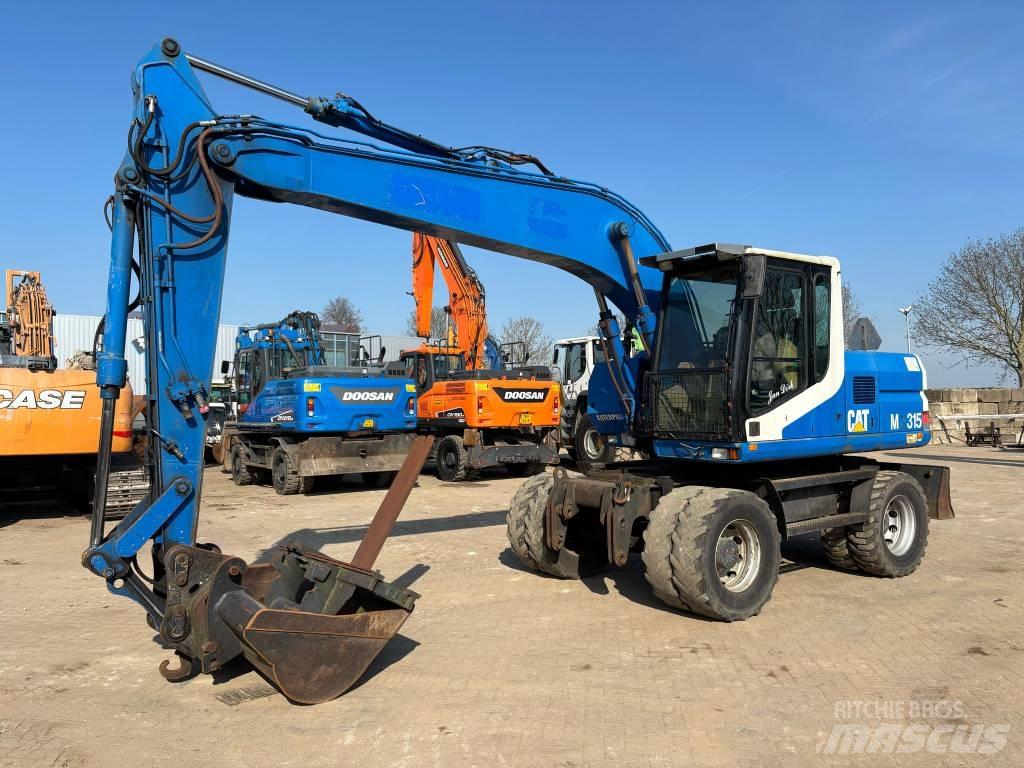 CAT M 315 Lastik tekerli ekskavatörler