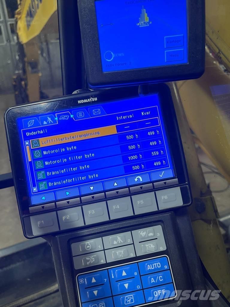 Komatsu PW 160 Lastik tekerli ekskavatörler