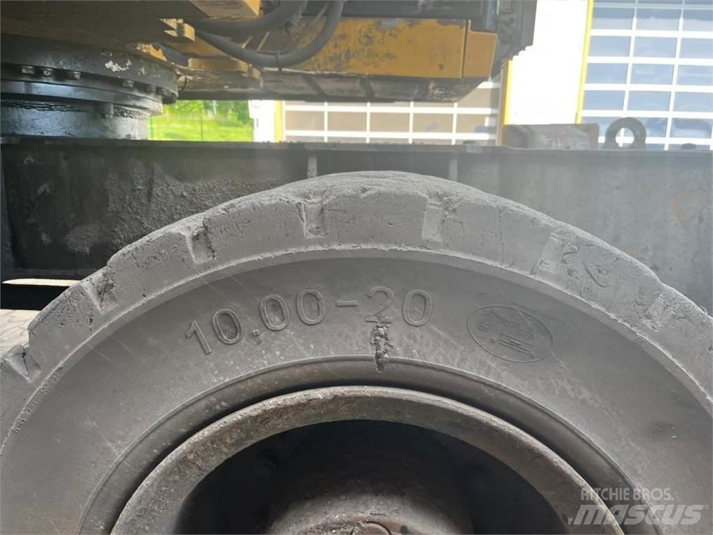CAT MH3026 Lastik tekerli ekskavatörler