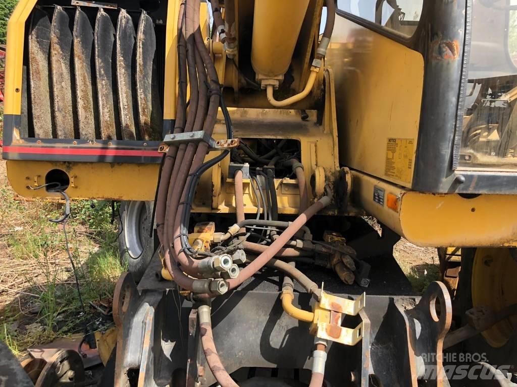 CAT M 312 FOR PARTS Lastik tekerli ekskavatörler