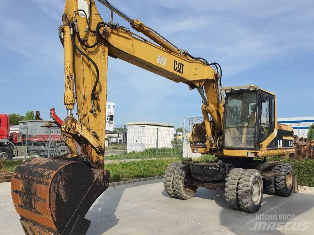 CAT M 318 Lastik tekerli ekskavatörler