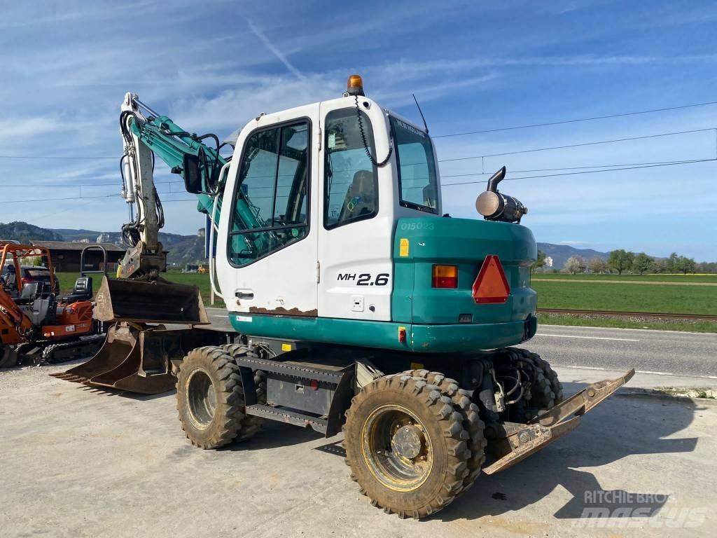 New Holland MH 2.6 Lastik tekerli ekskavatörler