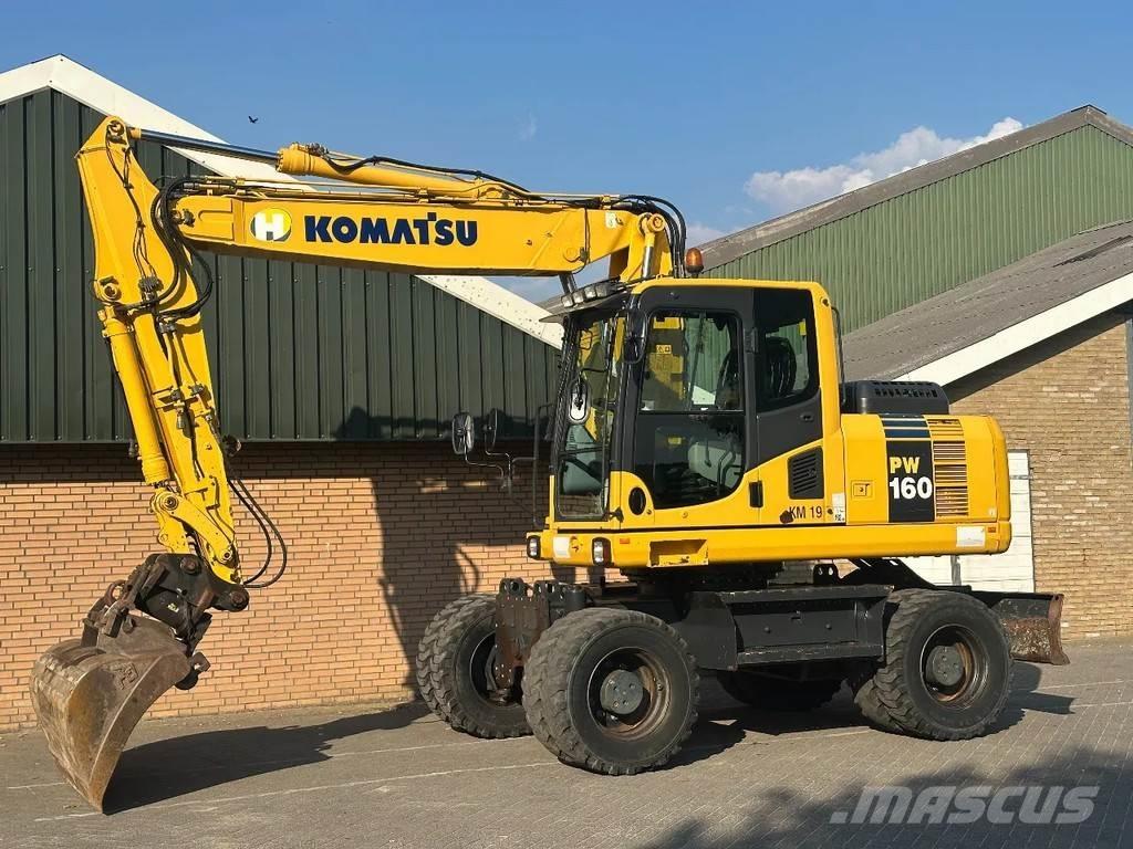 Komatsu PW160-8 Lastik tekerli ekskavatörler