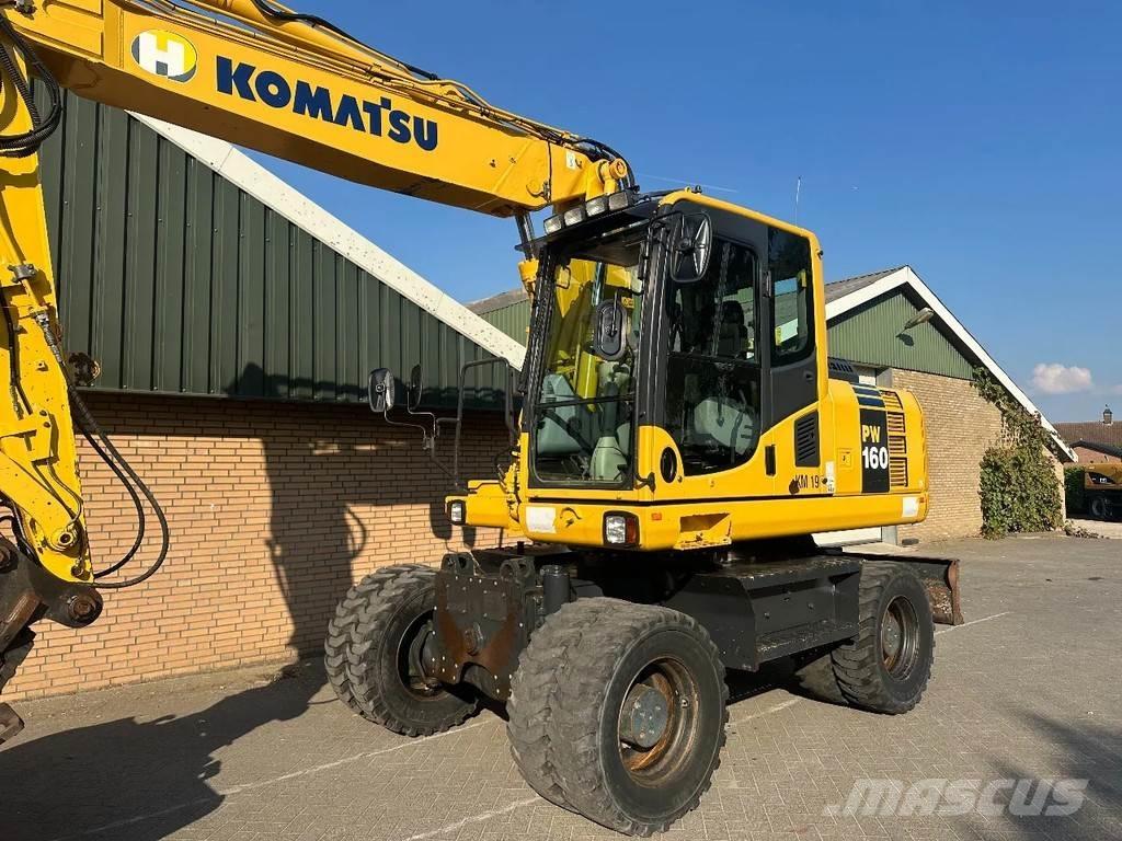 Komatsu PW160-8 Lastik tekerli ekskavatörler