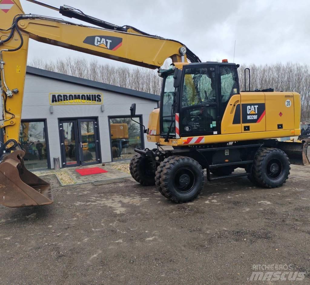 CAT M320 F Lastik tekerli ekskavatörler