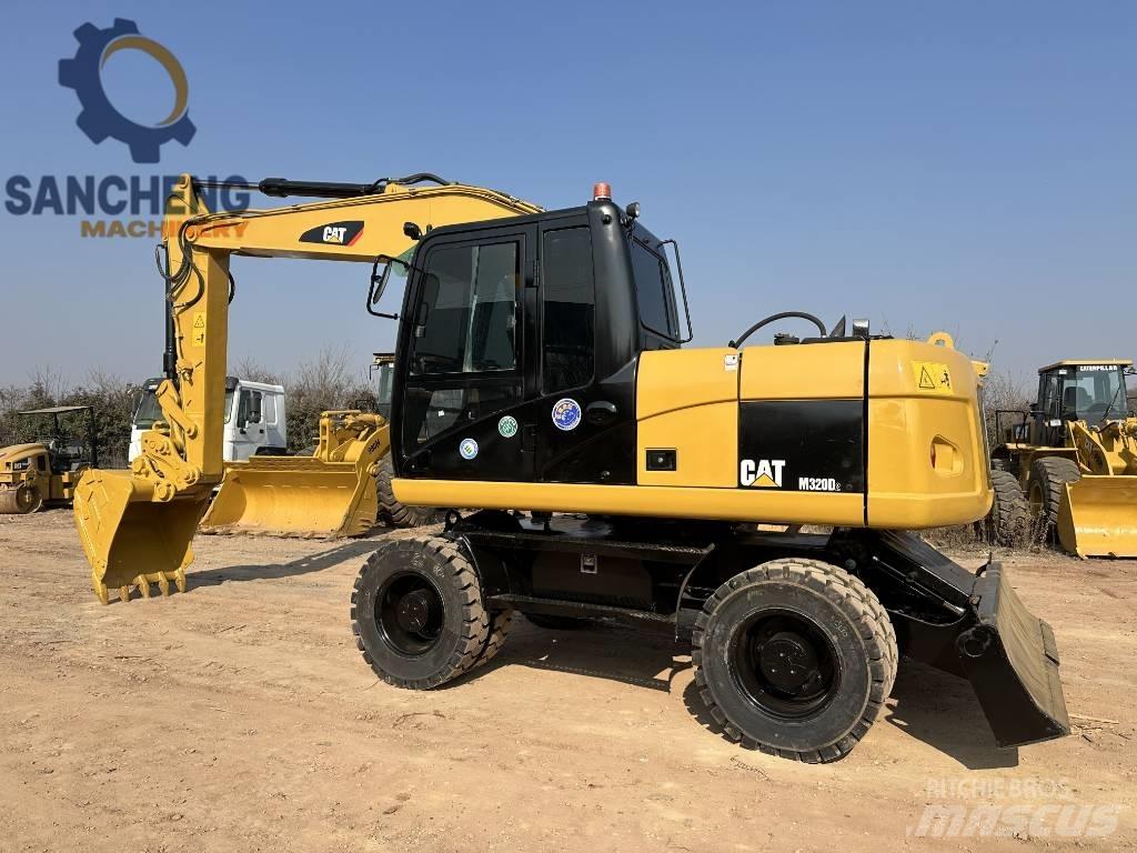 CAT M 320 D Lastik tekerli ekskavatörler