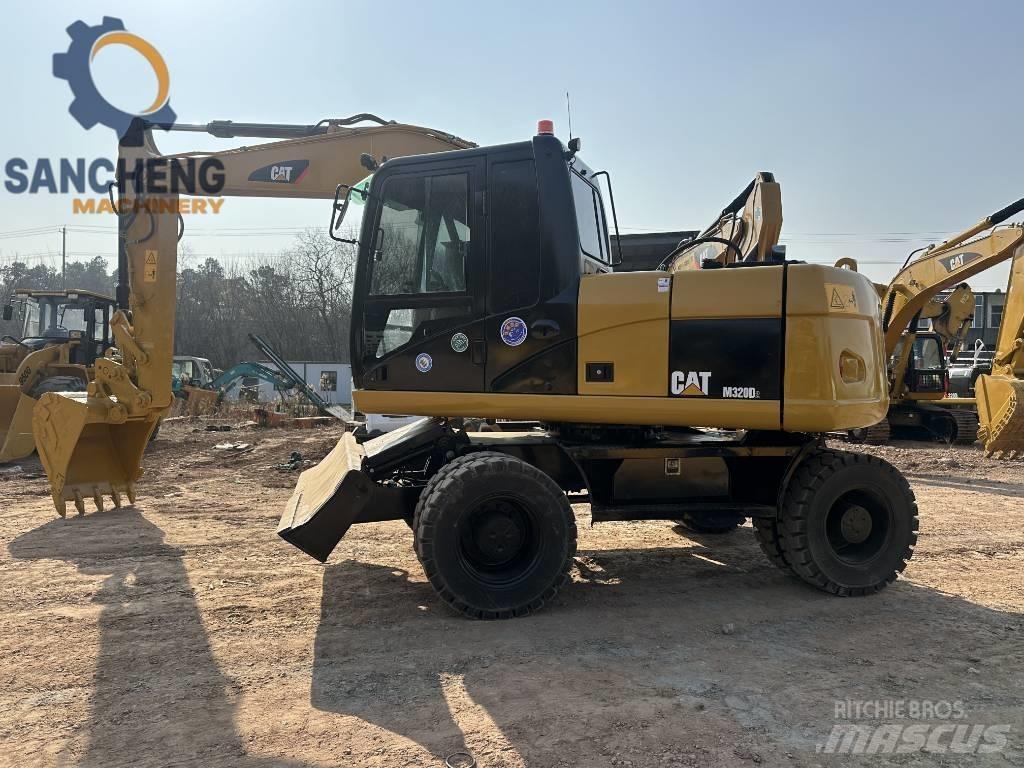 CAT M 320 D Lastik tekerli ekskavatörler
