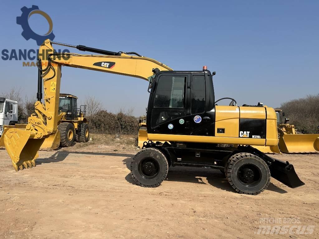 CAT M 320 D Lastik tekerli ekskavatörler