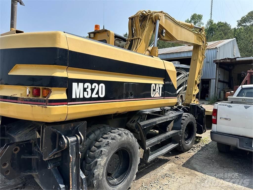 CAT M320 Lastik tekerli ekskavatörler