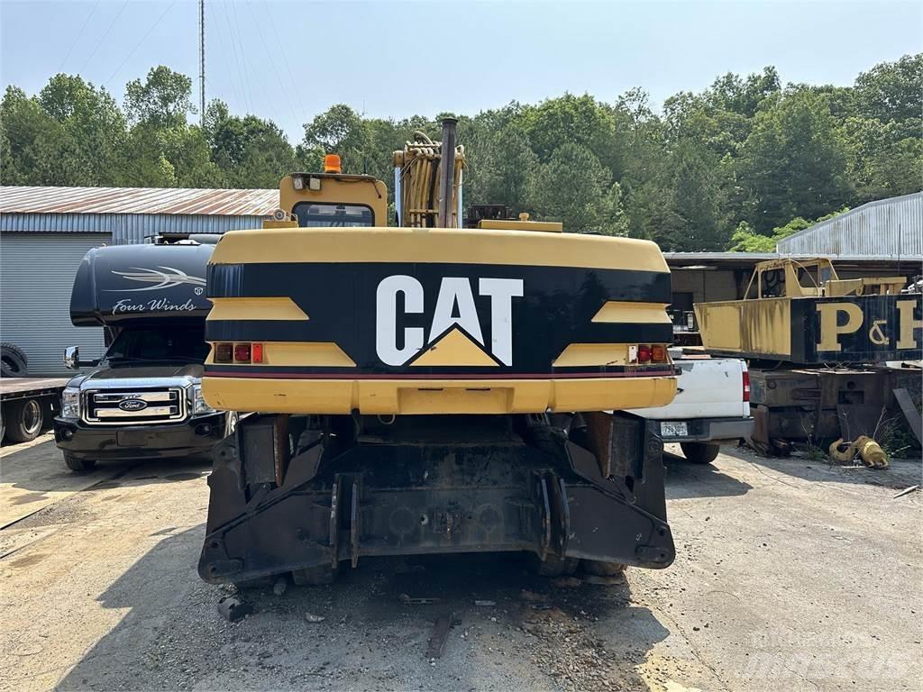 CAT M320 Lastik tekerli ekskavatörler
