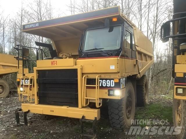 CAT 769D Belden kirma kaya kamyonu