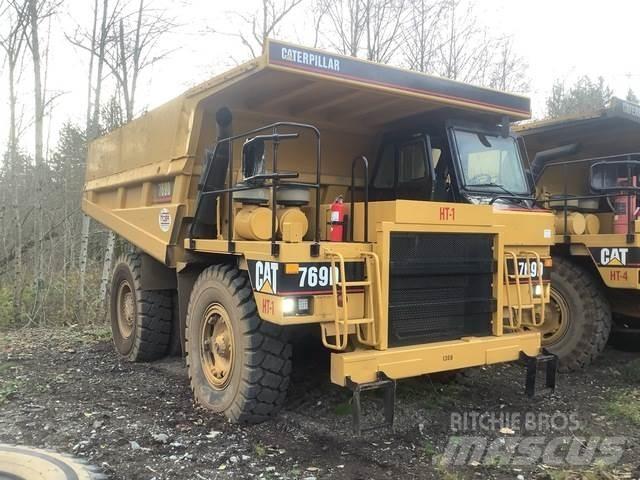 CAT 769D Belden kirma kaya kamyonu