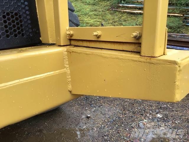CAT 775D Belden kirma kaya kamyonu