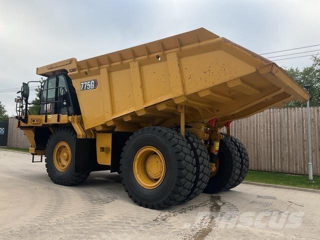 CAT 775G Belden kirma kaya kamyonu