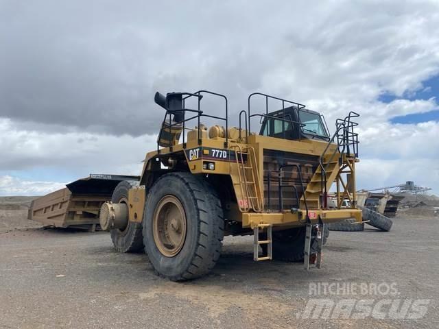 CAT 777D Belden kirma kaya kamyonu