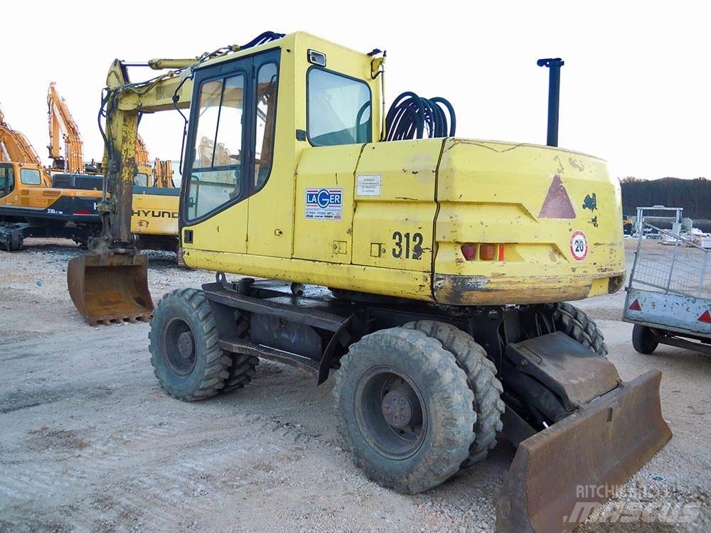 CAT M312 Lastik tekerli ekskavatörler
