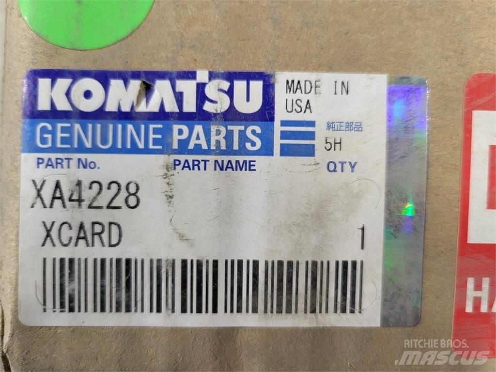 Komatsu XA4228 Belden kirma kaya kamyonu
