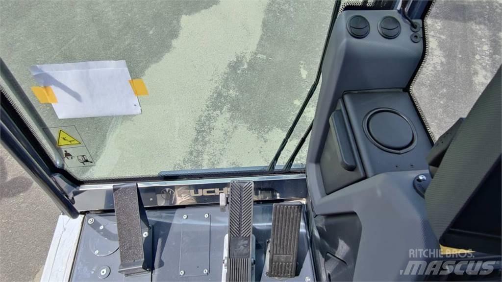 Fuchs MHL 320 Lastik tekerli ekskavatörler