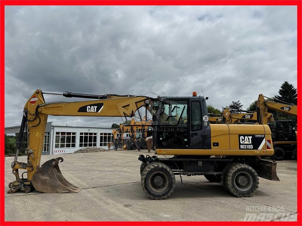 CAT M 318 D Lastik tekerli ekskavatörler