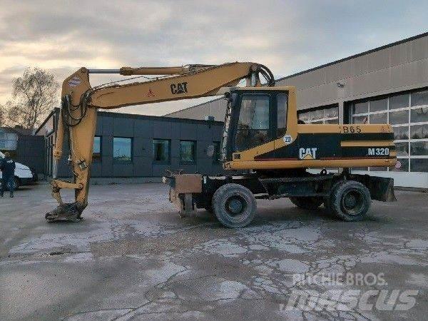 CAT M320 Lastik tekerli ekskavatörler