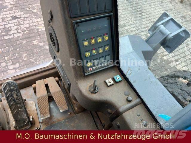 Fuchs MHL 350 Lastik tekerli ekskavatörler