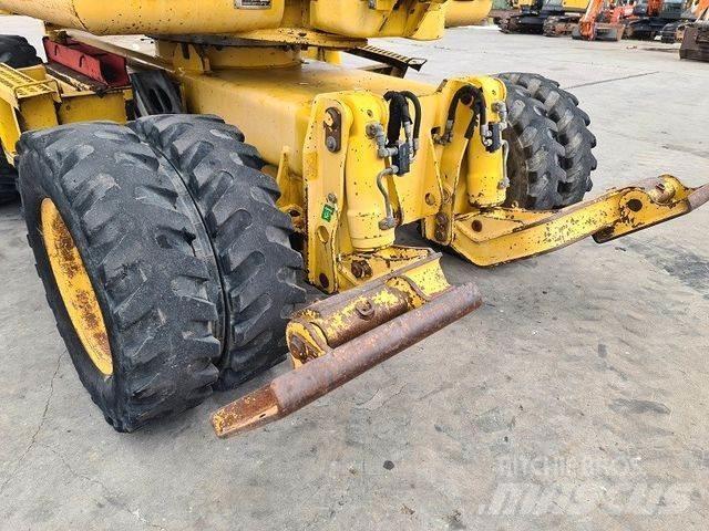 Komatsu PW 110 Lastik tekerli ekskavatörler