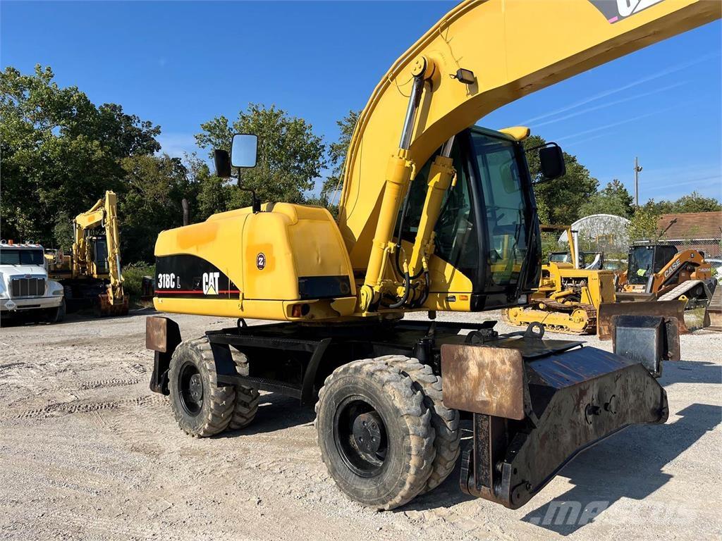 CAT M318C Lastik tekerli ekskavatörler