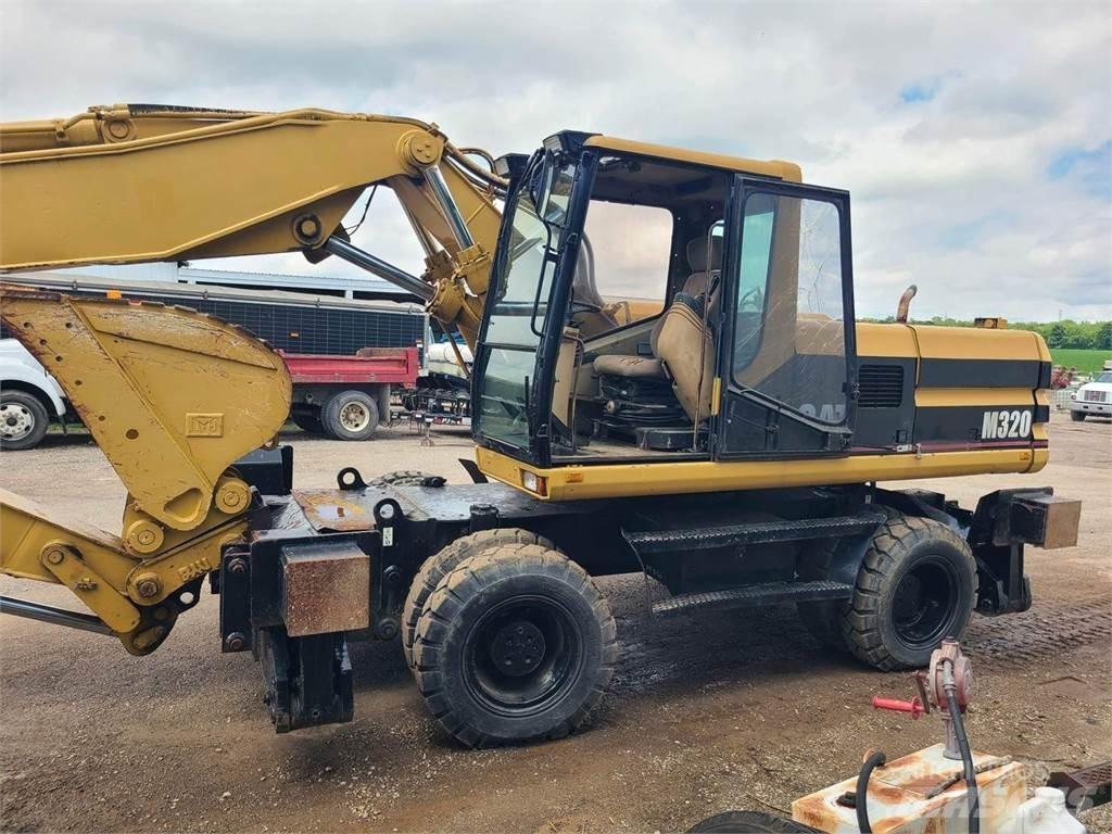 CAT M320 Lastik tekerli ekskavatörler