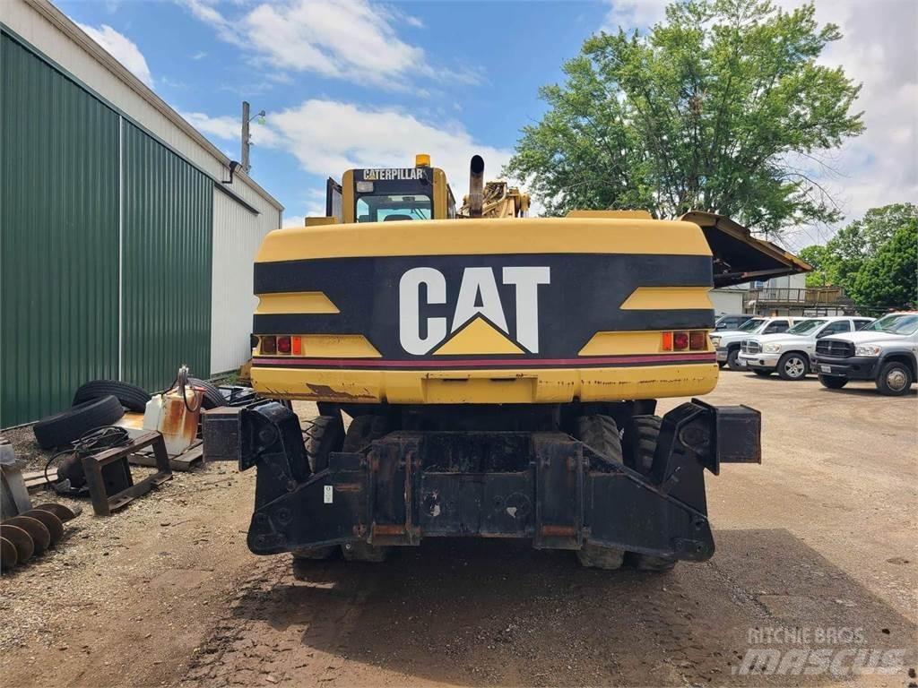 CAT M320 Lastik tekerli ekskavatörler
