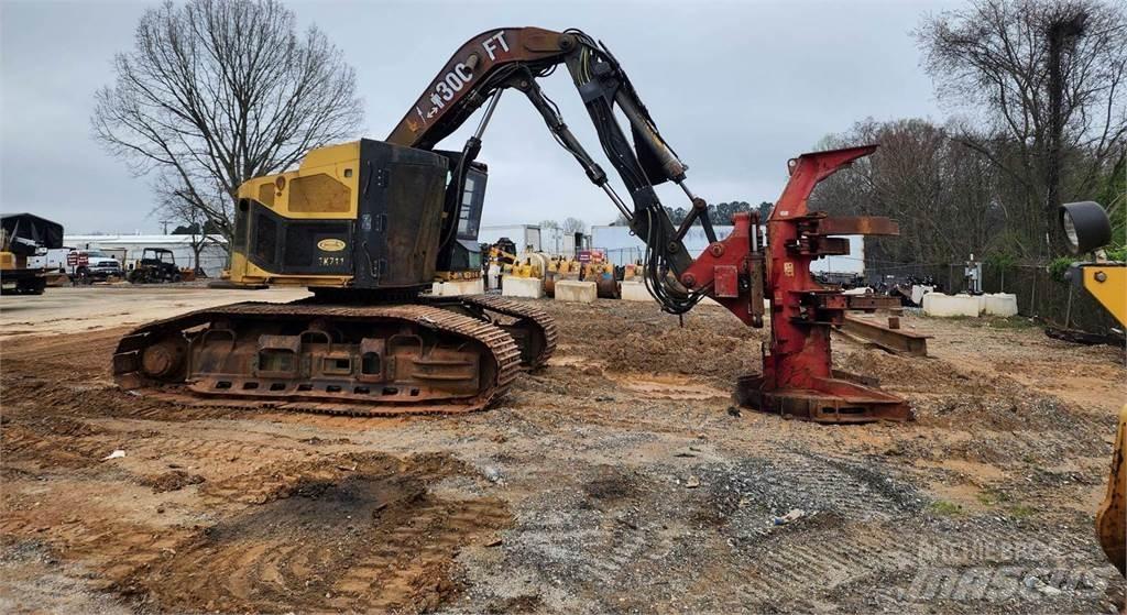 CAT TK711 Ağaç kesici istifleyiciler