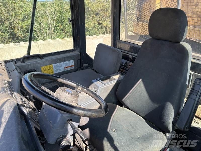 Komatsu HM300-1 Belden kirma kaya kamyonu