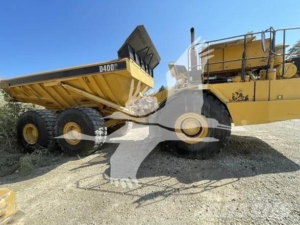 CAT D400D Belden kirma kaya kamyonu