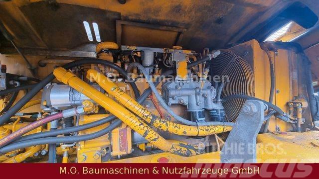 Liebherr A 312 / VSA / Schalengreifer / Lastik tekerli ekskavatörler